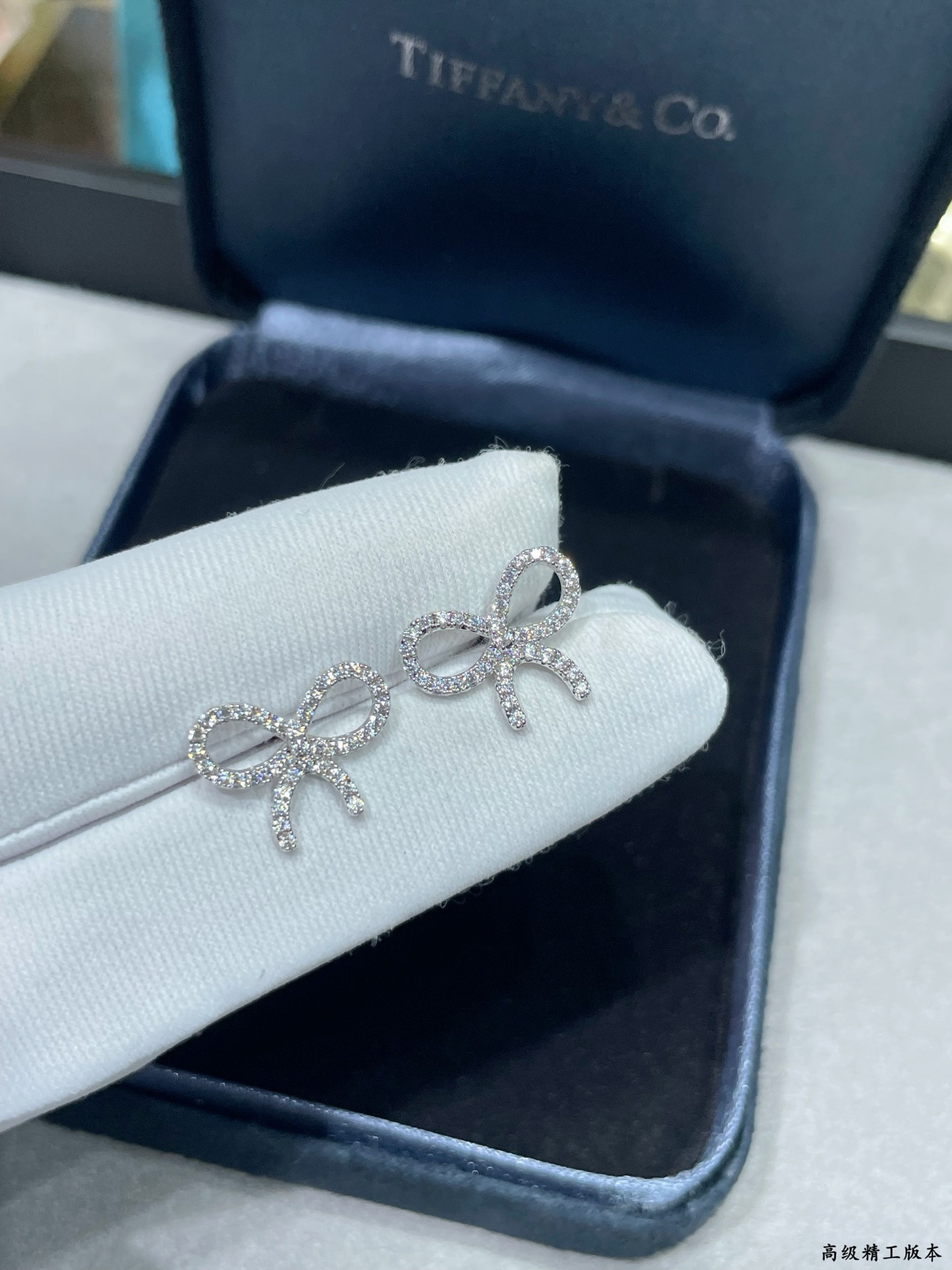 t*f*ny & co. D1am0nd-encrusted bow stud earrings