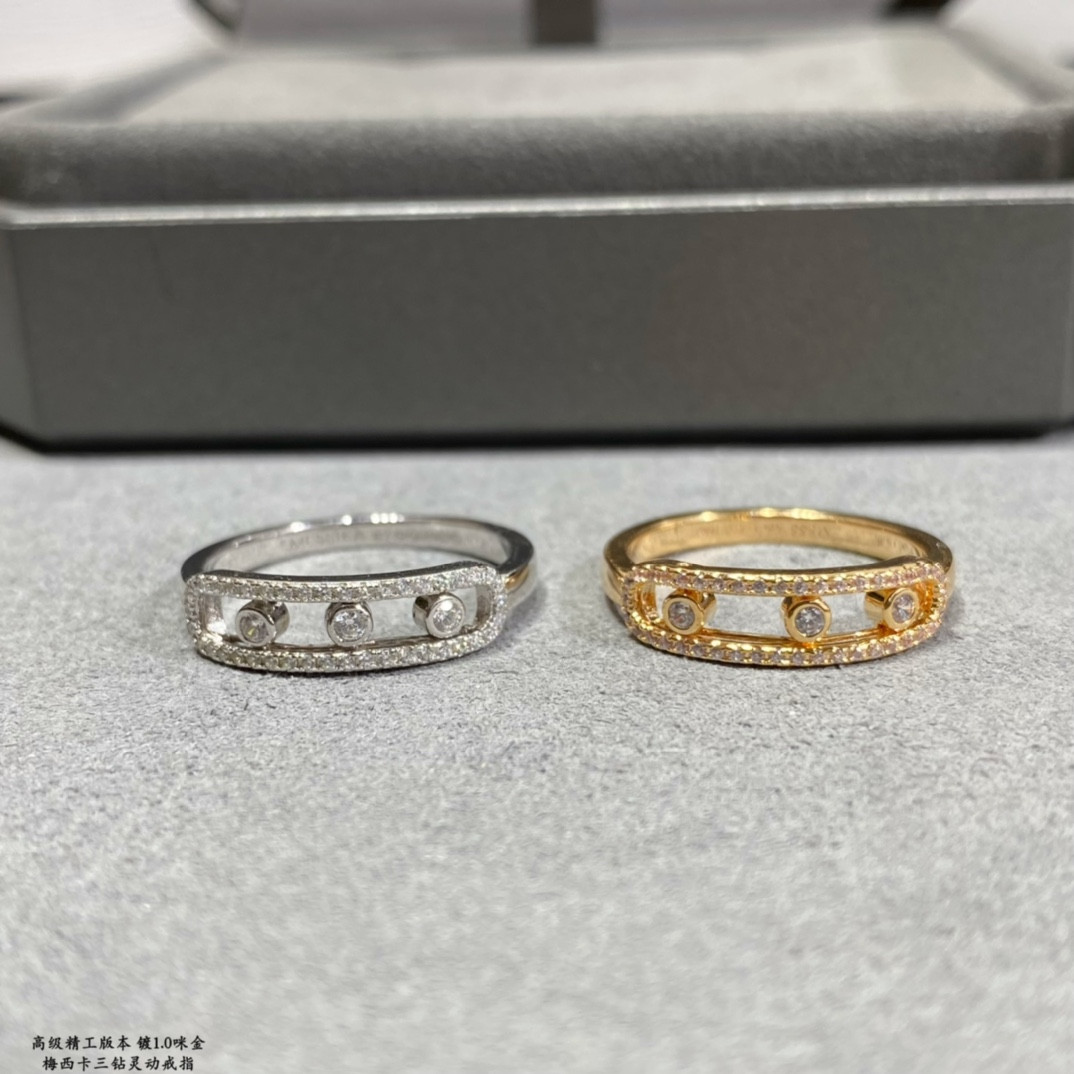 Mes1kaa three d1am0nd moving ring