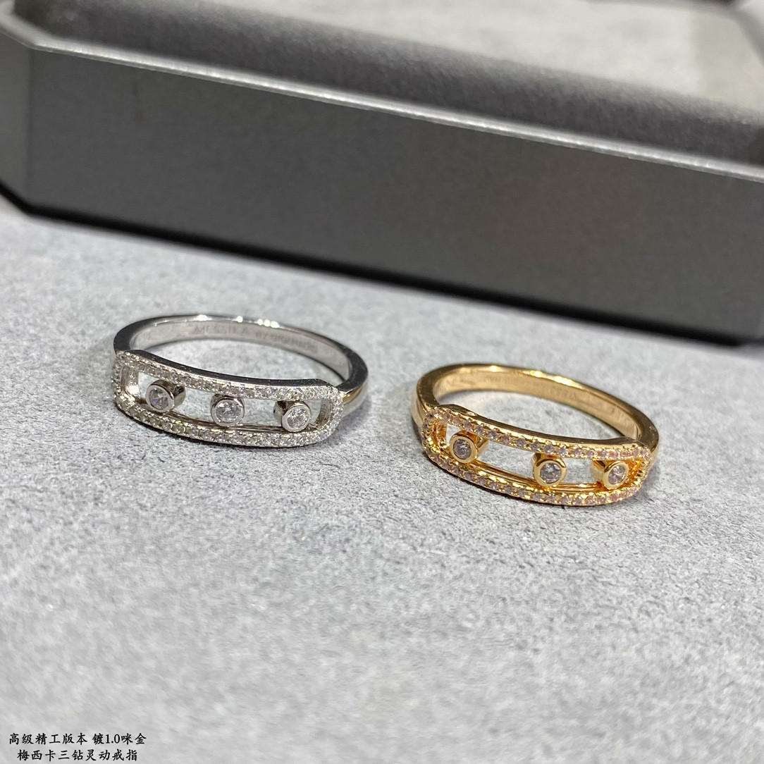 Mes1kaa three d1am0nd moving ring