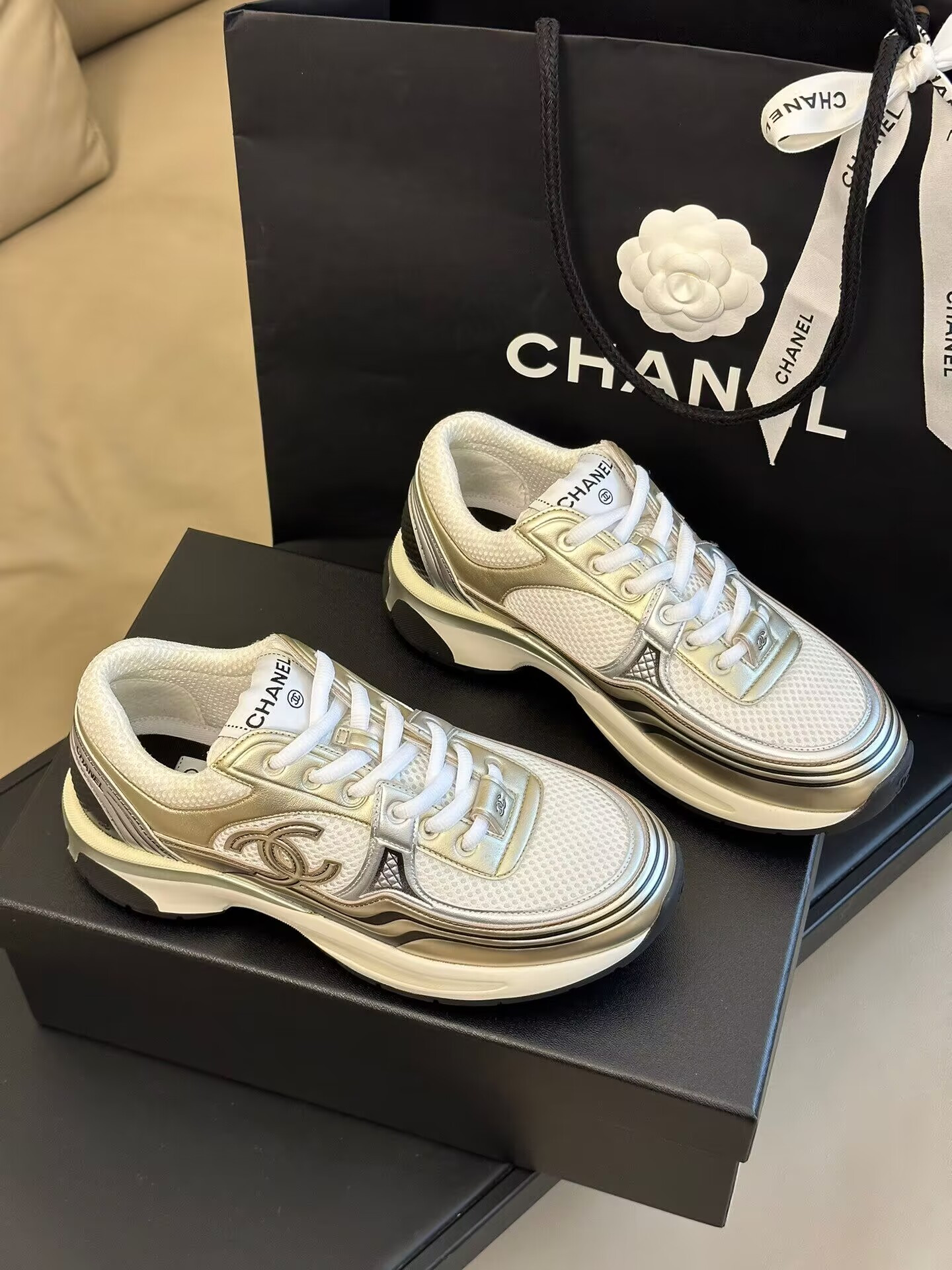 Ch**el CC Runner Gold Laminate