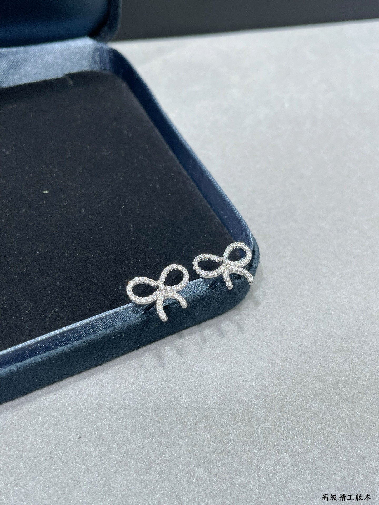 t*f*ny & co. D1am0nd-encrusted bow stud earrings