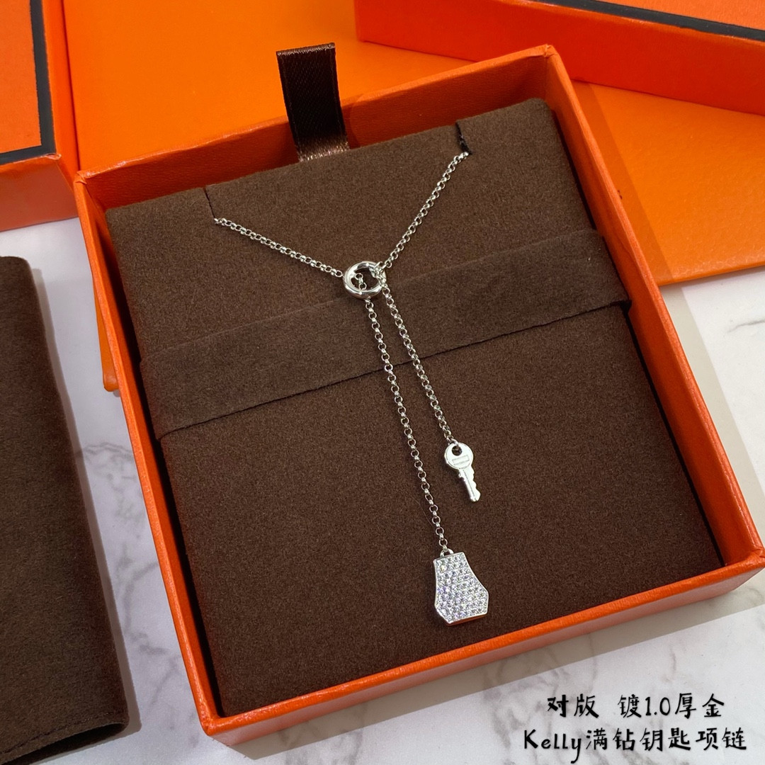 H**me5 Lock and Key Necklace