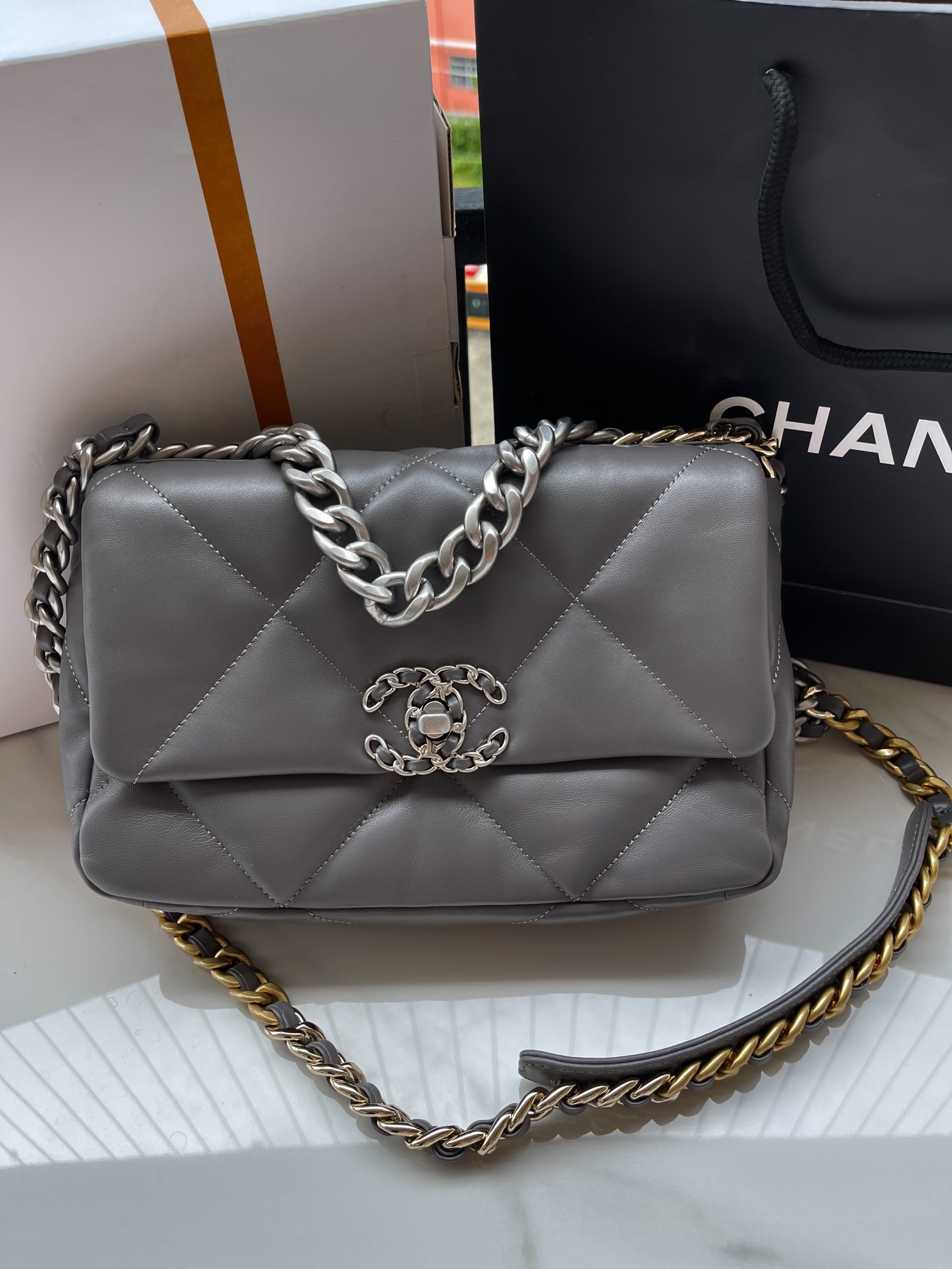 Ch**el 19 HANDBAG Shiny Leather, Gold-Tone, Silver-Tone & Ruthenium-Finish Metal Dark Gray 6.2 × 10.1 × 3.5 in