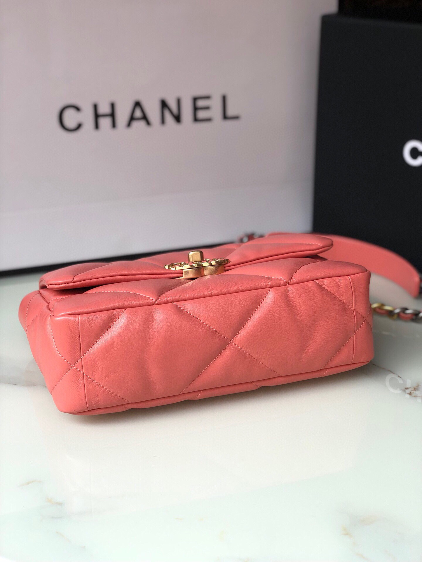 Ch**el 19 HANDBAG Shiny Pink Gold-Tone, Silver-Tone & Ruthenium-Finish Metal 6.2 × 10.1 × 3.5 in