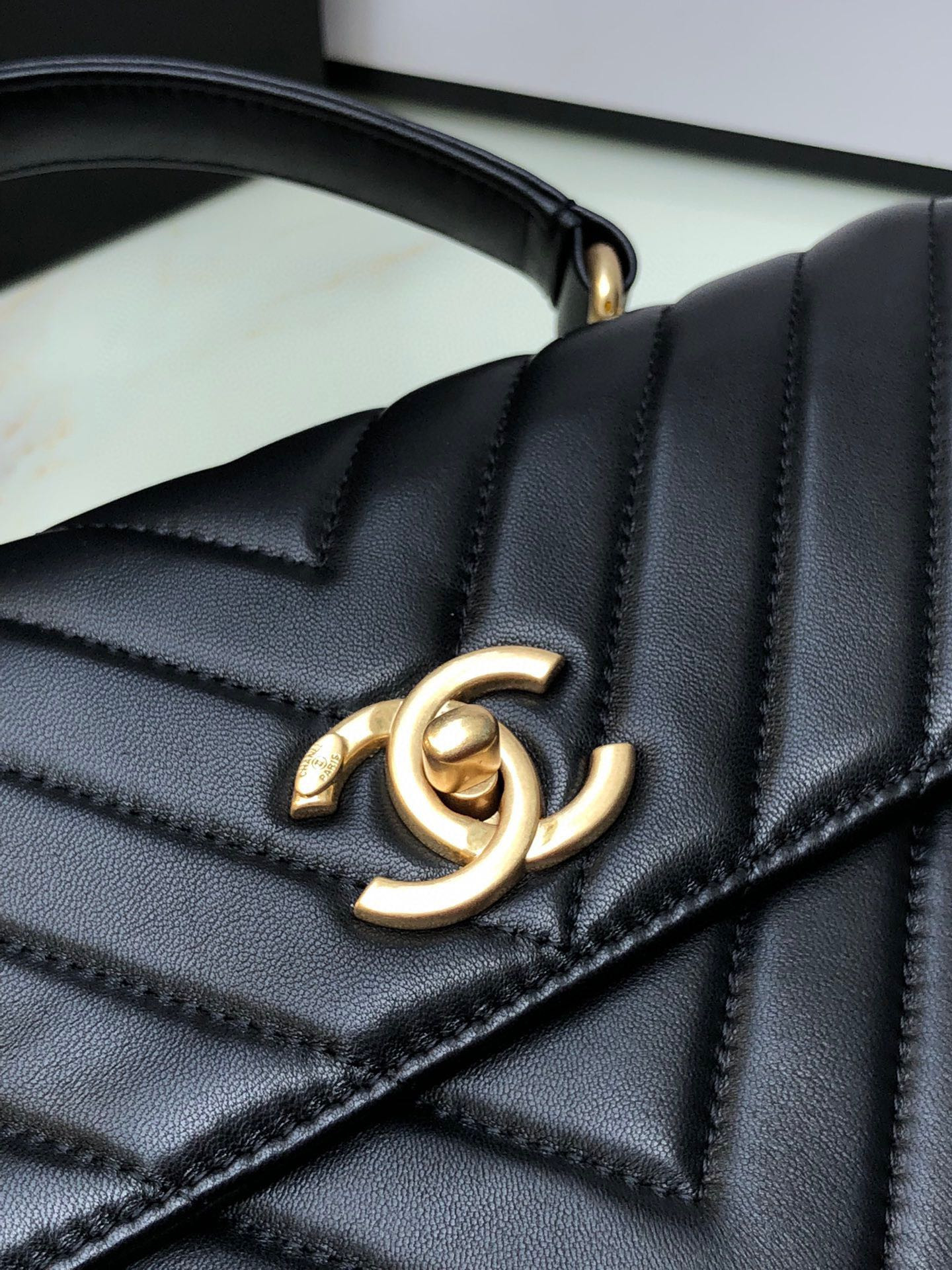 Ch**el FLAP BAG WITH TOP HANDLE 6.6 × 9.8 × 4.7 in