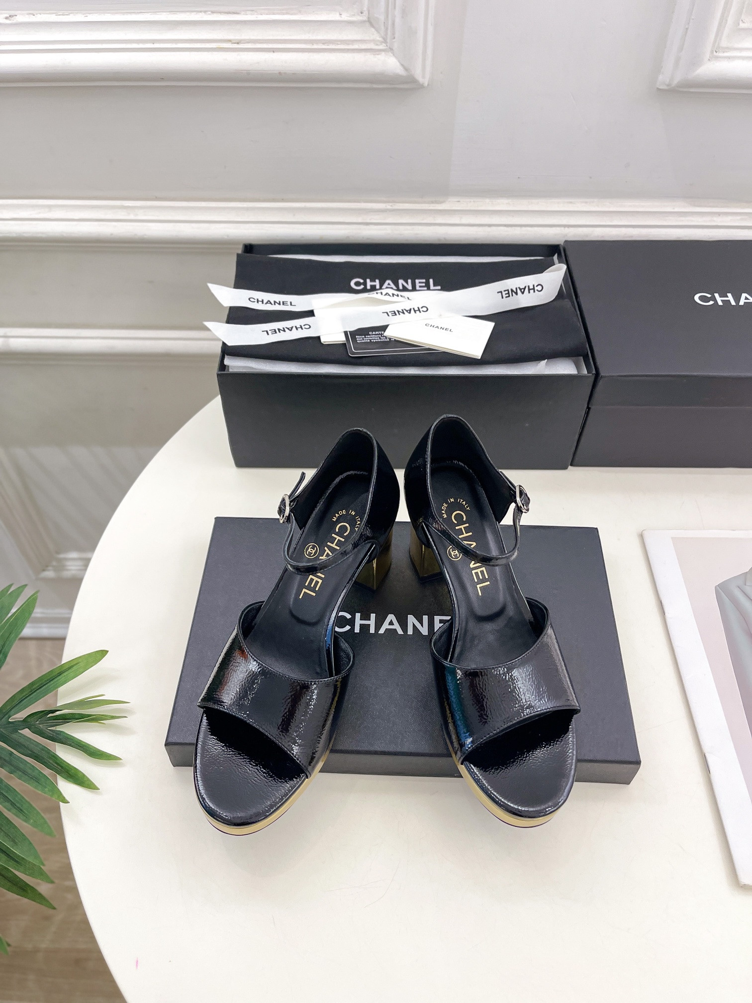 UA Ch**el HEELED SANDALS
